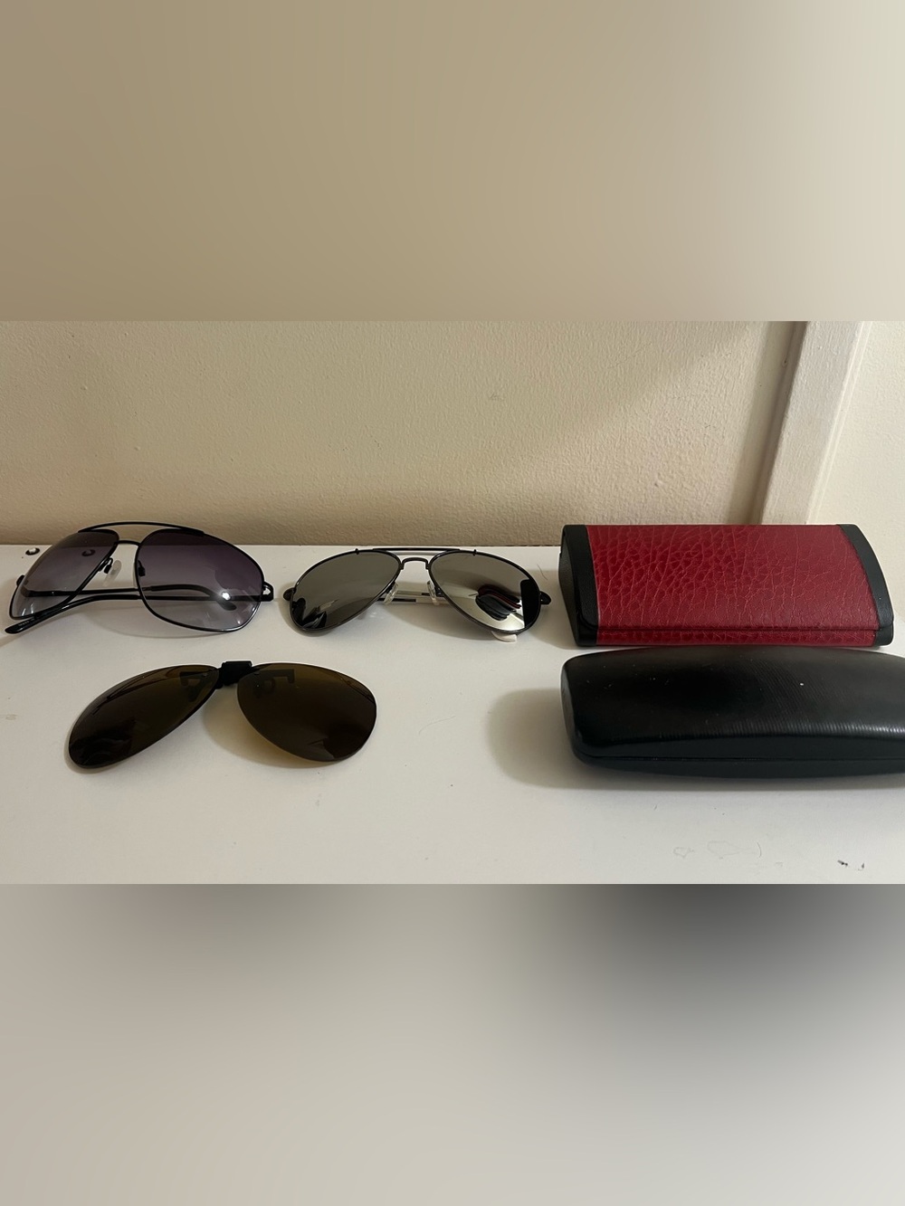 Two pairs of aviator sunglasses and clip-ons-price of Each